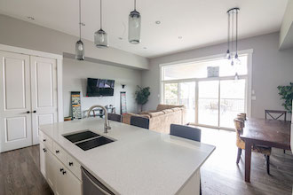 white clean kitchen living area